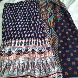 Two piece sleeveless tunic and pants